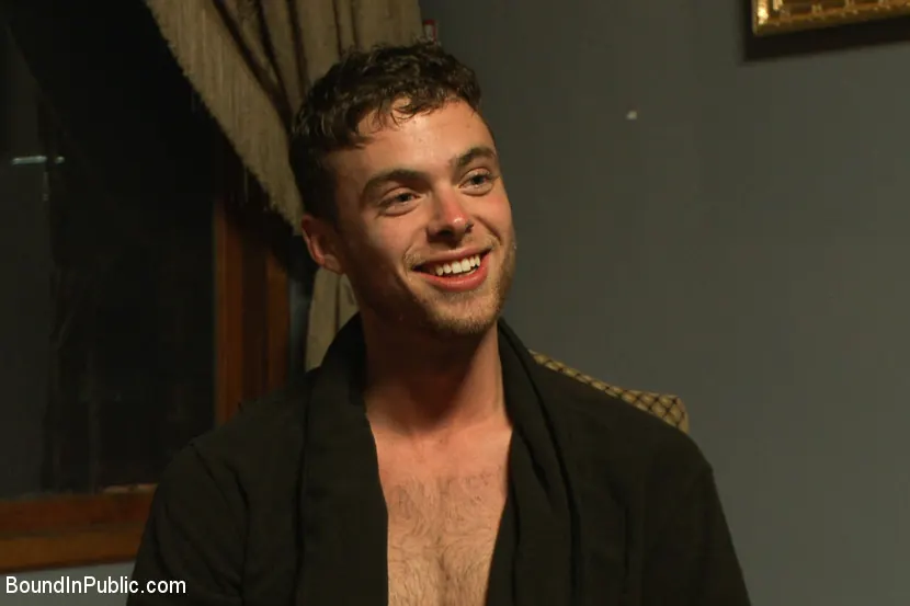 Kink Men 'Horny party goers gangbang and fist a bound stud's ass' starring Brandon Moore (Photo 6)