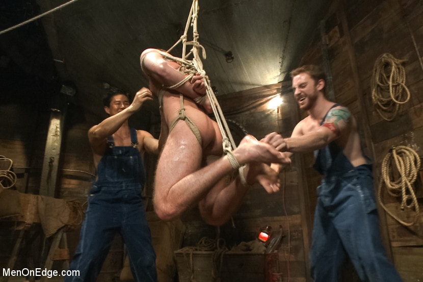 Kink Men 'Hairy Muscle Hunk Has His Cock Edged By Two Farmers' starring Brayden Forrester (Photo 6)