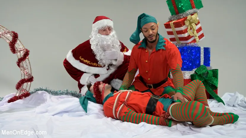 Kink Men 'Impish Little Elves: Casey Everett Edged by Santa and his Lil Helper' starring Casey Everett (Photo 2)