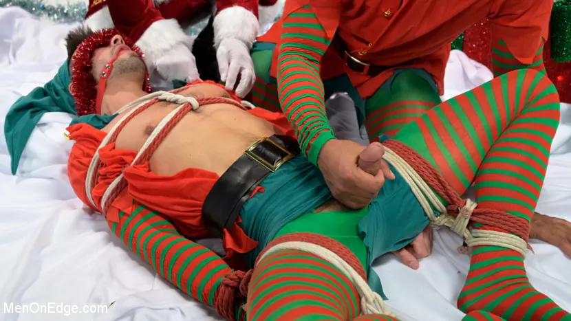 Kink Men 'Impish Little Elves: Casey Everett Edged by Santa and his Lil Helper' starring Casey Everett (Photo 3)