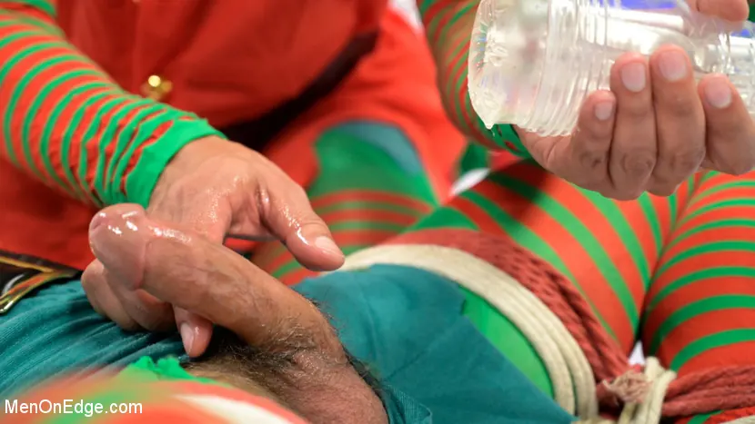 Kink Men 'Impish Little Elves: Casey Everett Edged by Santa and his Lil Helper' starring Casey Everett (Photo 6)