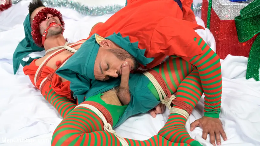 Kink Men 'Impish Little Elves: Casey Everett Edged by Santa and his Lil Helper' starring Casey Everett (Photo 9)