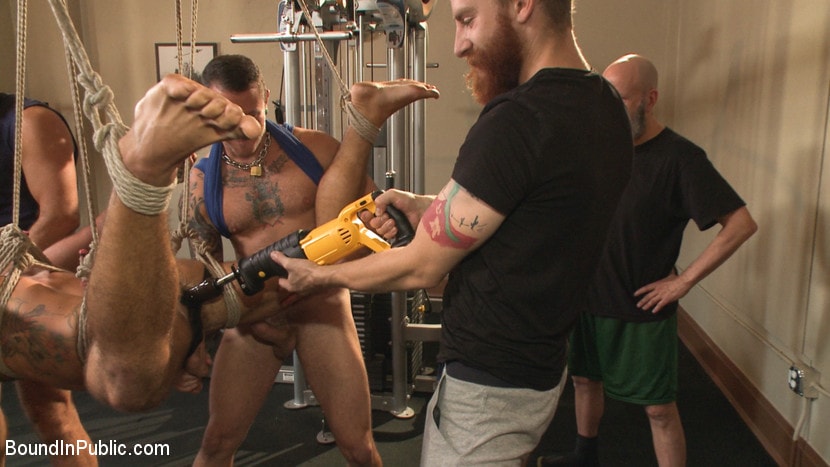 Kink Men 'Connor Maguire's Gym Slave Takes on a Weight Room Full of Cocks' starring Connor Maguire (Photo 12)