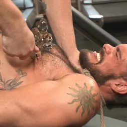 Connor Maguire in 'Kink Men' Ripped gym rat Aarin Asker takes a giant fist while in suspension (Thumbnail 7)