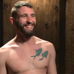 Jackson Fillmore in 'Kink Men' Suspended in a center split, helpless uncut stud blows a huge load! (Thumbnail 11)