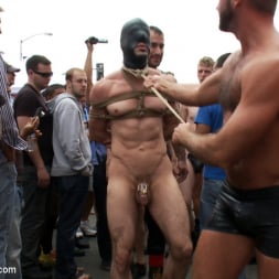 Josh West in 'Kink Men' Muscle slave is stripped naked, used and humiliated while hordes of people take photos. (Thumbnail 2)