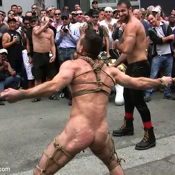 Josh West in 'Kink Men' Muscle slave is stripped naked, used and humiliated while hordes of people take photos. (Thumbnail 9)