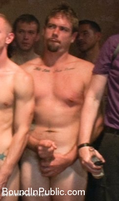 Kink Men 'Stud in a metal cage is fucked by horny bar patrons' starring Kirk Cummings (Photo 13)
