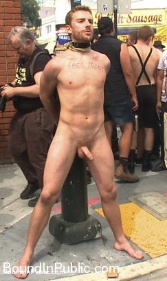 Kink Men 'Stud in a metal cage is fucked by horny bar patrons' starring Kirk Cummings (Photo 14)