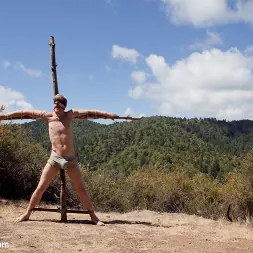Logan Stevens in 'Kink Men' Captured and edged in the deep woods (Thumbnail 5)