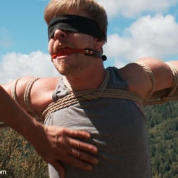 Logan Stevens in 'Kink Men' Captured and edged in the deep woods (Thumbnail 9)