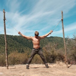 Logan Vaughn in 'Kink Men' Captured straight jock gets his tight ass violated in the deep woods (Thumbnail 1)