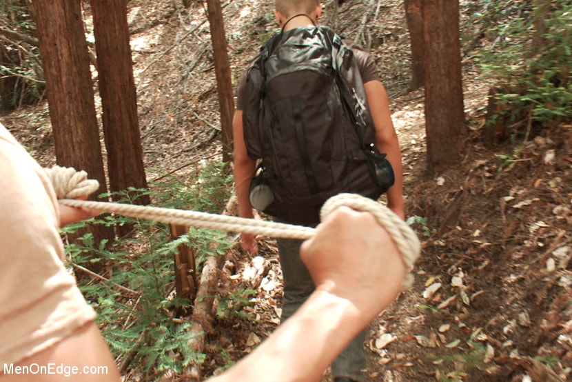 Kink Men 'Captured straight jock gets his tight ass violated in the deep woods' starring Logan Vaughn (Photo 2)