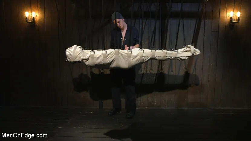 Kink Men 'Metal Rack to Sleep Sack: Captive Boy's Thick Cock Edged Mercilessly' starring Scotty Zee (Photo 10)