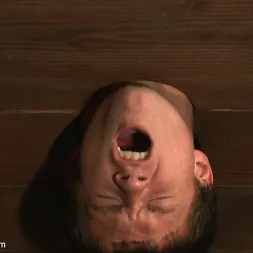 Tyler Sweet in 'Kink Men' Caged sex slave endures a beating, hot wax and hard stockade fuck (Thumbnail 4)